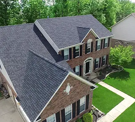 new asphalt shingle roof on a two-story brick home in connecticut installed by expert local roofing contractor
