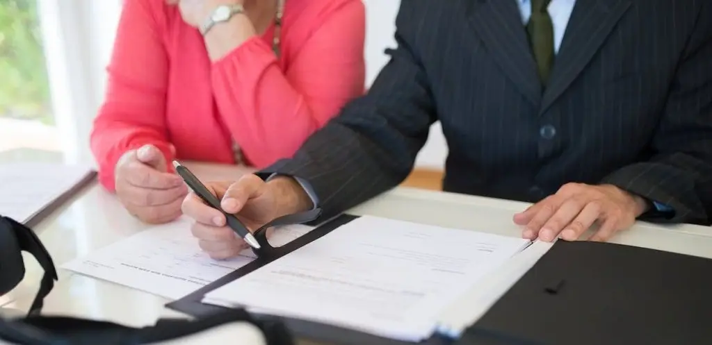 Homeowners meeting with Premier Improvements Solar expert for a personalized solar consultation in East Hartford Connecticut.